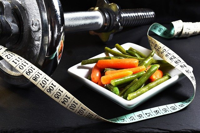 <img src="dumb bell, tape measure and a plate of vegetables.jpg" alt="how to exercise for weight loss"/>