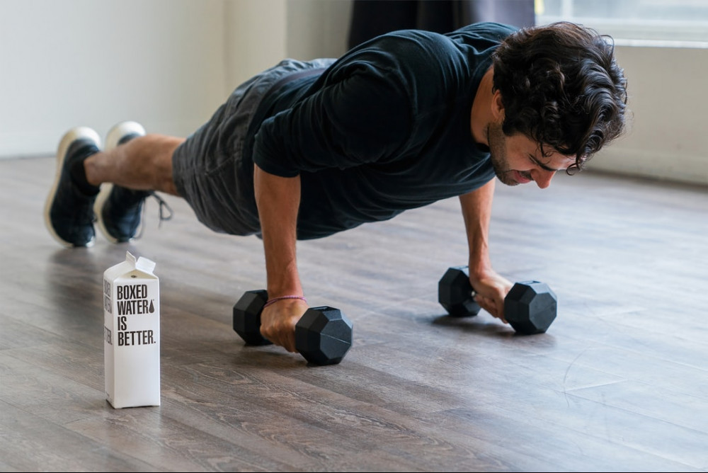 <img src="man performing push-ups on dumb bells.jpg" alt="how to exercise for weight loss"/>