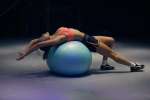 <img src="woman stretching on exercise ball.jpg" alt="how to exercise for weight loss"/>